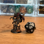 Female Black Dragonborn Rogue · Painted Mini · 28mm